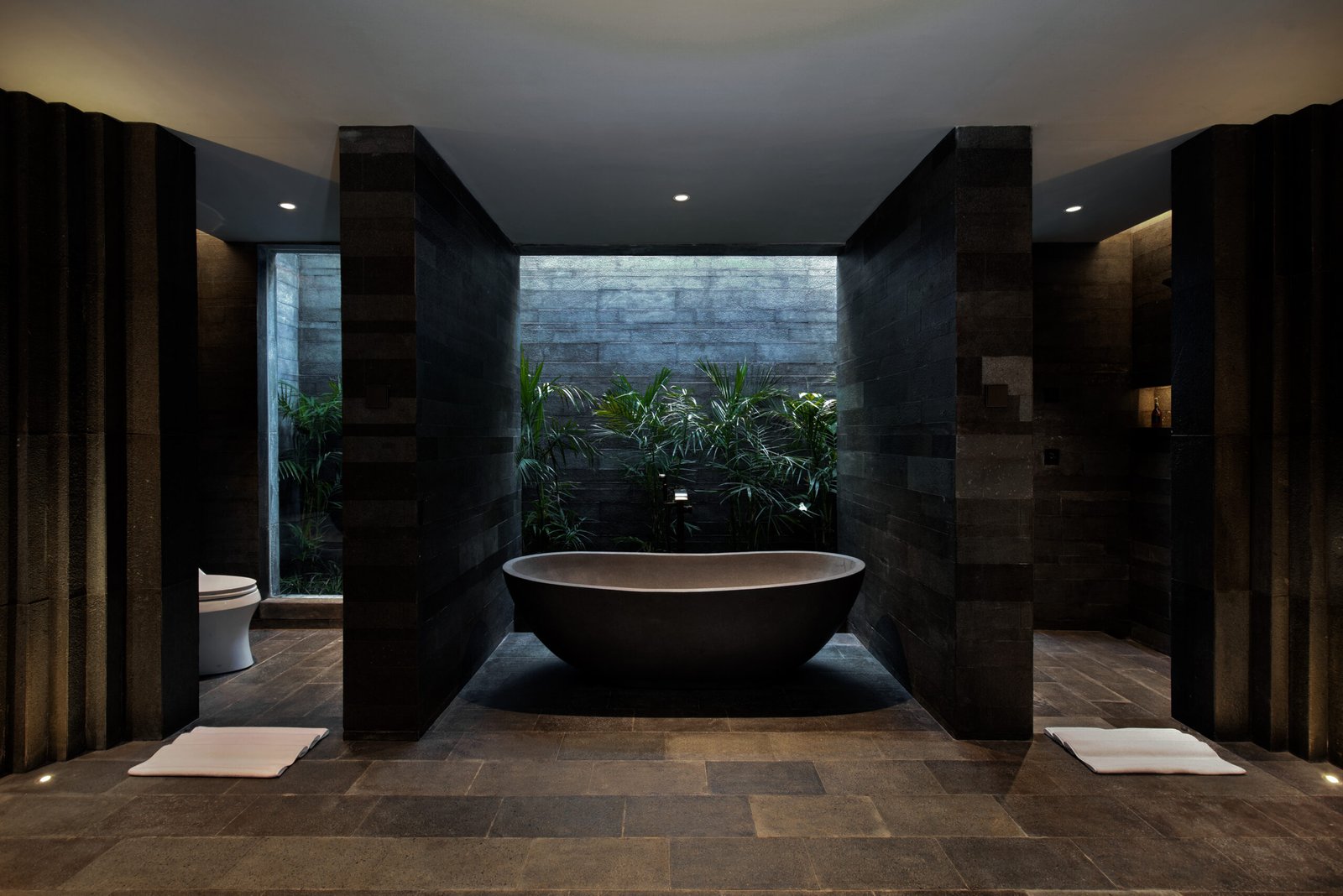 Freestanding luxury bathtub in SARAS Room at Ayatara Villa Ubud Kintamani Bali – a romantic villa in Bali with indoor-outdoor spa ambiance for airbnb bali lovers and honeymooners.