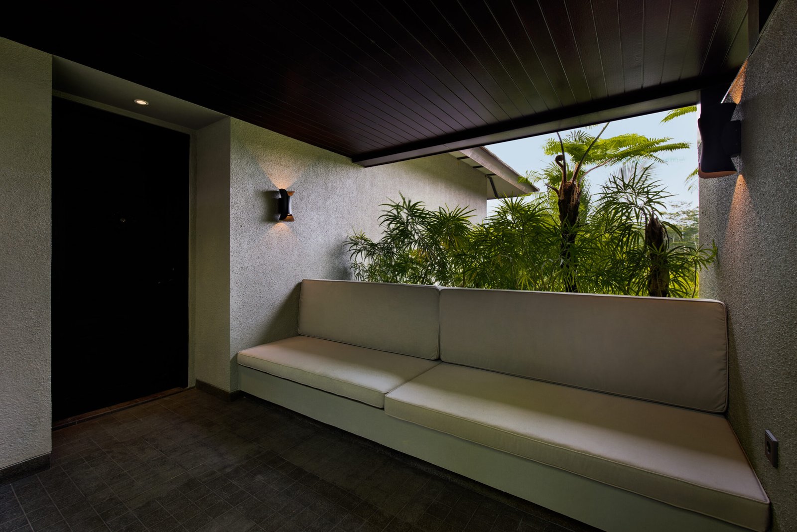 Private balcony lounge at SNEHA Room, Ayatara Villa Ubud Kintamani Bali – a quiet airbnb bali ubud-inspired villa in Bali with tropical seating area.