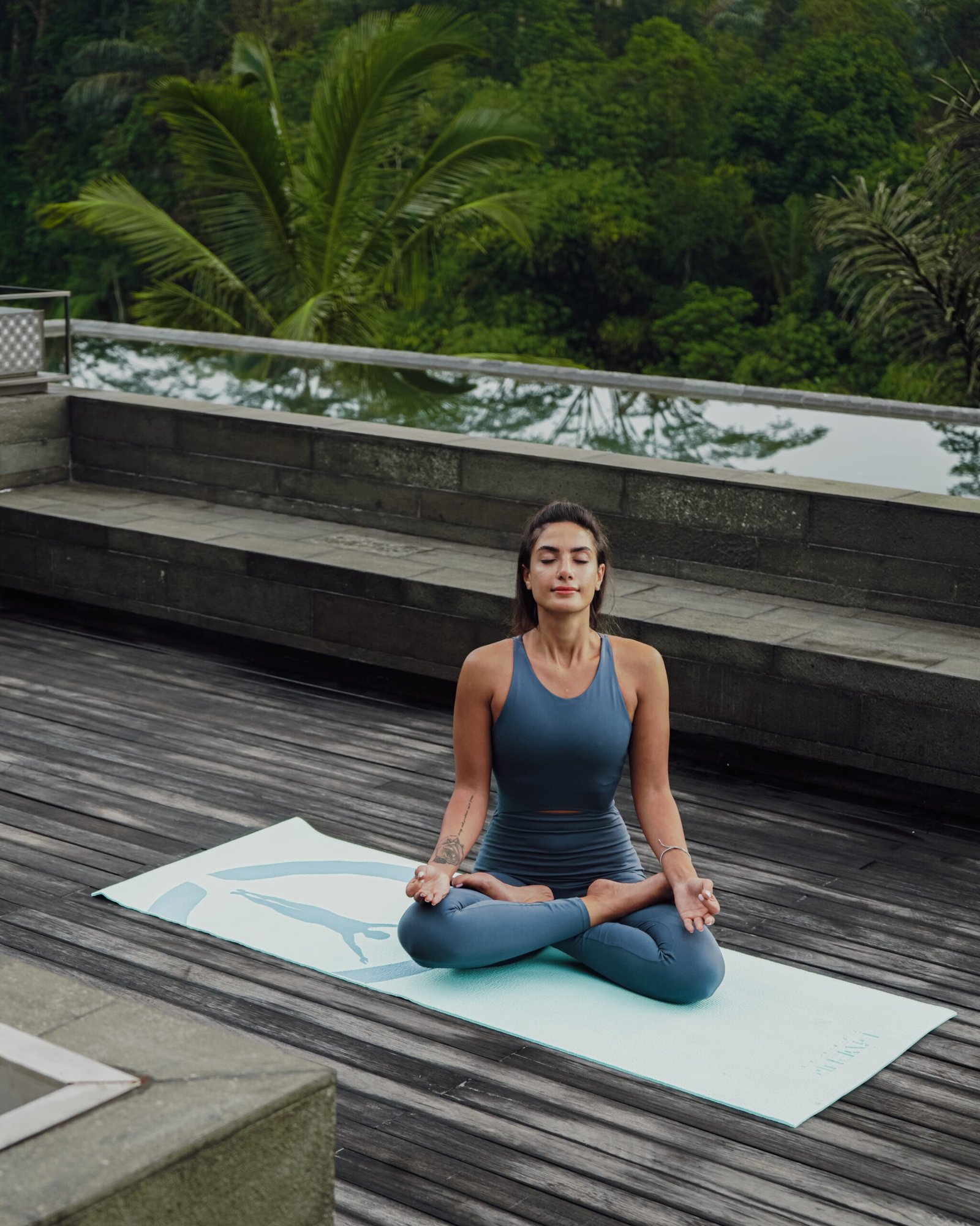 Guest practicing outdoor yoga at Ayatara Villa Ubud Kintamani Bali – a wellness-focused villa in Bali surrounded by forest, ideal for airbnb bali ubud and villa ubud bali seekers.