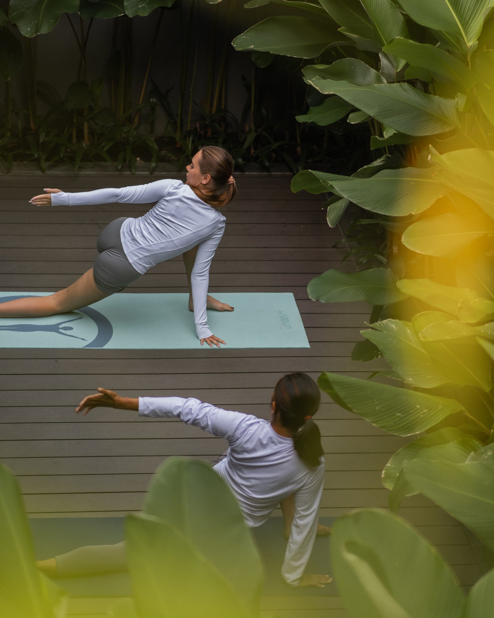 Yoga session in lush greenery at Ayatara Villa Ubud Kintamani, a peaceful Bali villa for solo and wellness travelers