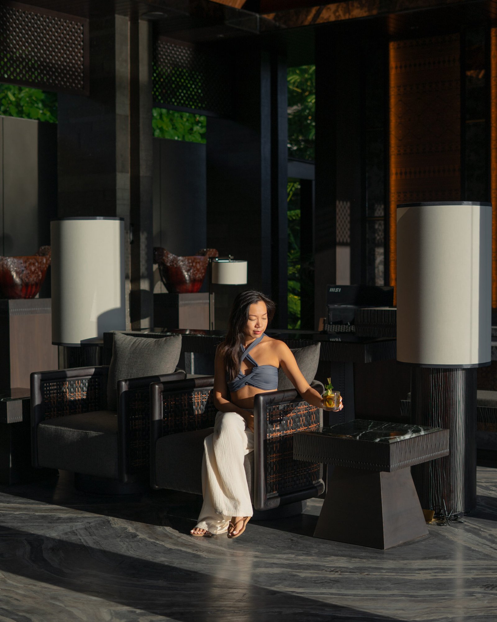 Solo female guest enjoying afternoon tea at Ayatara Villa Ubud Kintamani, a boutique villa bali